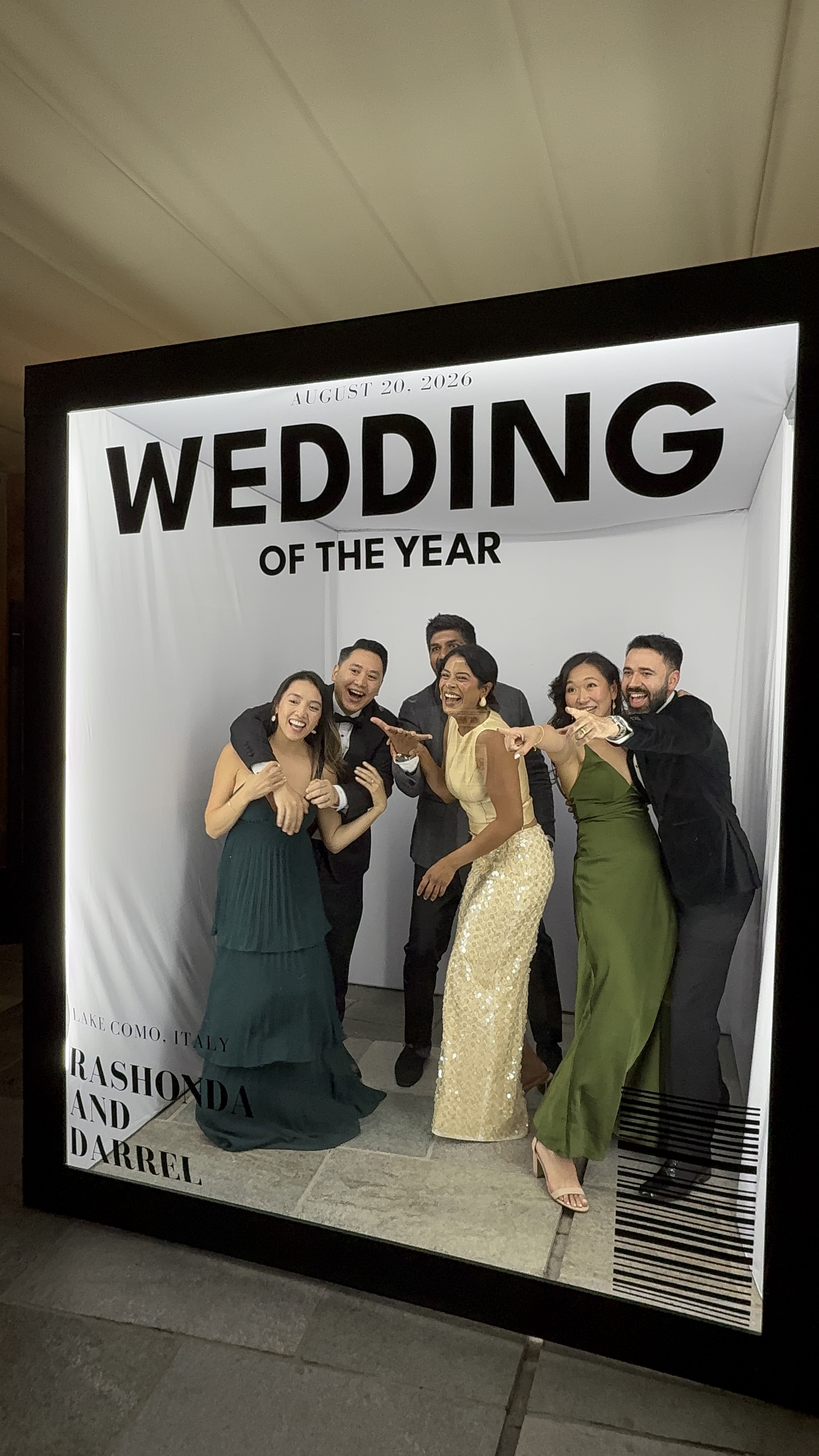 Group of guests celebrating inside Vogue Booth